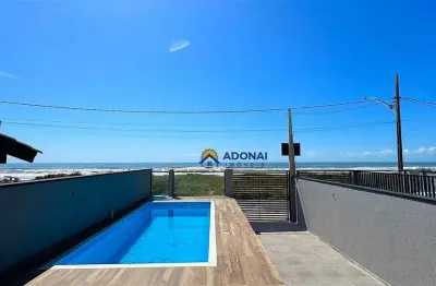 Sobrado de frente para o mar, com 3 dormitórios à venda, 160 m² por r$ 1.680.000 - brejatuba - guaratuba/pr