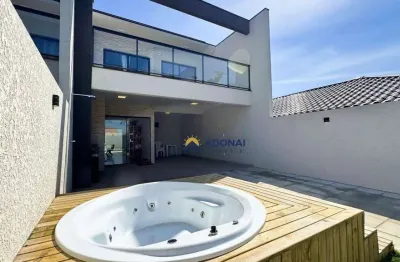 Sobrado novo a 1 quadra do mar, com 3 dormitórios à venda, 140 m² por r$ 750.000 - coroados - guaratuba/pr
