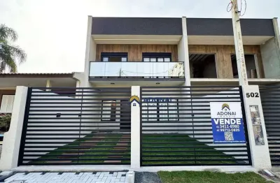 Sobrado novo de alto padrão de acabamento, com 4 dormitórios à venda, 153 m² por r$ 1.200.000 - centro - guaratuba/pr