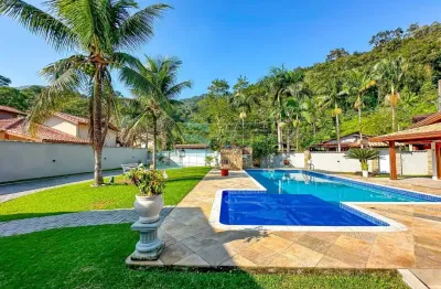 Casa em condomínio fechado com 4 quartos à venda na rua guaivira, 437, mar verde, caraguatatuba, 321 m2 por r$ 1.999.999