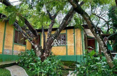 Linda casa na praia massaguaçu, com quintal arborizado e com excelente localização