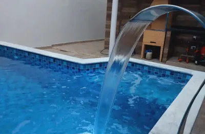 Casa      a  venda    em  itanhaem  com  75 metros    com 2 dormitorios  2 vagas e piscina