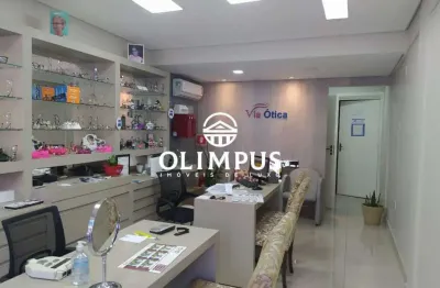 Prédio comercial com salas e apartamentos no bairro centro