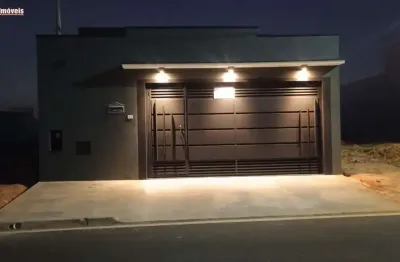 Sala pé direito alto 3,90 mts  cozinha com cooktop  três dormitórios, uma suite cor ar condicionado instalado  wc social  area gourmet  garagem para dois carros  portão eletrônico com motor  piso e re