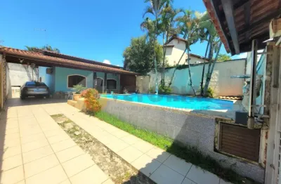 Casa com 2 dormitórios e piscina, martim de sá  caraguatatuba sp