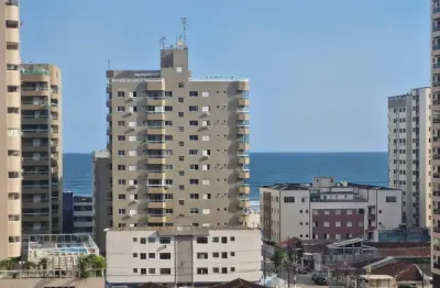 Apartamento semi- mobiliado, 2 dormitórios, 1 suíte, 1 vaga, varanda gourmet com churrasqueira a carvão ampla e aconchegante, no bairro aviação praia grande sp