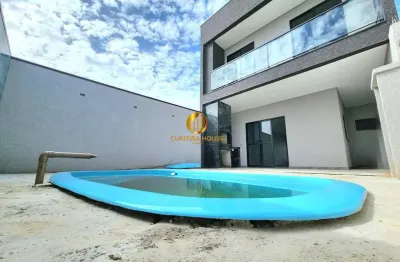 Sobrado alto padrão 3 quartos sendo 1 suíte,  espaço gourmet e espaçoso fundos com piscina no eucaliptos fazenda rio grande