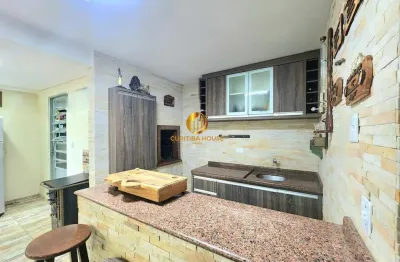 Sobrado com 3 quartos sendo uma suíte master, espaço gourmet no xaxim curitiba