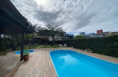Casa em condomínio fechado com 4 quartos para alugar na rua orlando teixeira, 411, rio tavares, florianópolis, 443 m2 por r$ 20.000