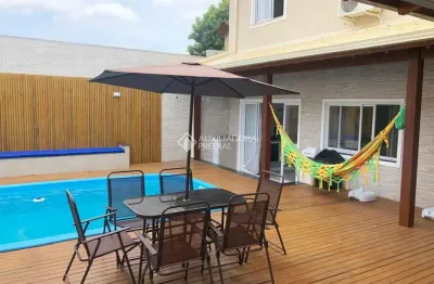 Casa com 4 quartos para alugar na Rua Recanto das Gaivotas, 500, Rio Tavares, Florianópolis, 400 m2 por R$ 15.400