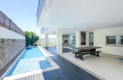 Casa com 4 quartos para alugar na rua carlos drummond de andrade, 61, lagoa da conceição, florianópolis, 455 m2 por r$ 22.980