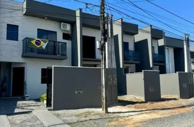 Sobrado geminado NOVO  à venda em Joinville-SC, Vila Nova, 3 quartos, 1 suíte, 3 salas, 3 banheiros, 2 vagas, 126,73m².