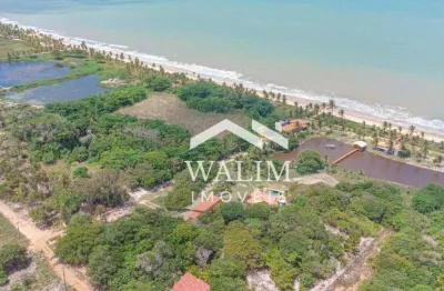Casa à beira-mar com lagoa, piscina e ampla área verde – praia dos corais, alcobaça/ba