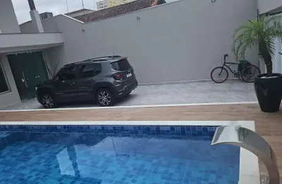 Sobrado com 3 dormitórios à venda, 360 m² por r$ 1.500.000,00 - vila assunção - praia grande/sp
