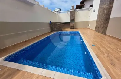 Casa em condomínio fechado com 2 quartos à venda na Rua Primeiro de Maio, 291, Vila Mirim, Praia Grande