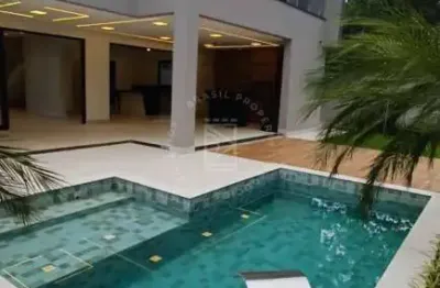 Sobrado, 4 suítes sendo 1 máster com closet, 400m², 4 vagas.