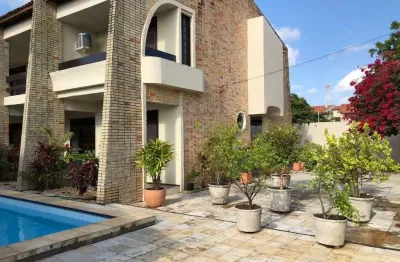 Casa com 5 quartos à venda na rua tancredo de souza carvalho, 150, edson queiroz, fortaleza por r$ 1.300.000