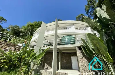 Linda casa com vista para o mar na praia vermelha do sul - ubatuba sp