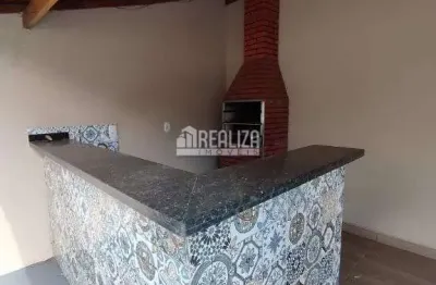 Casa a venda em uberaba, bairro conjunto guanabara - 2 dormitorios, churrasqueira e varanda