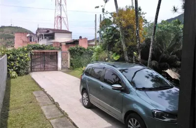 Casa com 5 quartos à venda na Rua Itapoan, Martim de Sá, Caraguatatuba