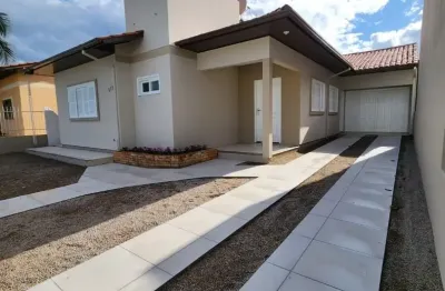 Casa de alvenaria com 03 dormitórios, sendo 2 suítes  sala de estar e jantar  cozinha  área de serviço  garagem  edícula com lavabo  quiosque com churrasqueira  perfeito para receber familiares e amig