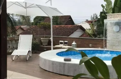 Casa com 4 dormitórios à venda, 293 m² por r$ 1.100.000 - praia das palmeiras - caraguatatuba/sp