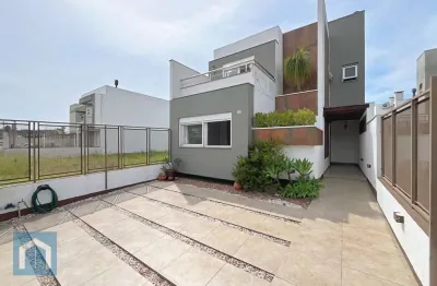 Casa com 3 quartos à venda na rua jean vardaramatos, 135, hípica, porto alegre por r$ 680.000
