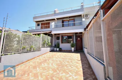 Casa com 3 quartos à venda na rua heitor kramer, 294, guarujá, porto alegre por r$ 545.000