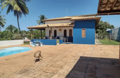 Chácara com casa de 4/4 sendo 2 suítes com 4.200m² de área total