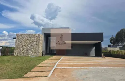Refúgio de luxo e privacidade: casa térrea integrada à natureza no village ipanema ii, onde o moderno encontra a natureza