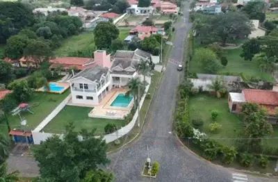 Casa de condomínio para venda com 517 metros quadrados com 5 quartos sendo 2 suites