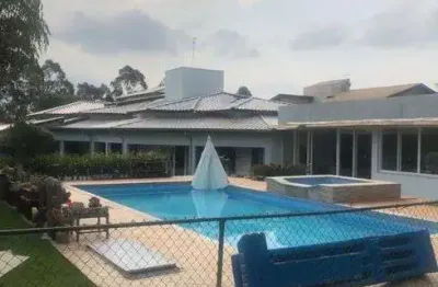 Casa de condomínio para venda com 450 metros quadrados com 4 quartos