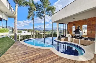 Casa com 3 dormitórios, 274 m² - venda por r$ 2.350.000,00 ou aluguel por r$ 16.122,00/mês - condomínio serra da estrela - atibaia/sp