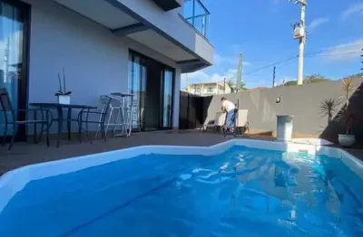 Casa com 4 suítes modernas mobiliada aprox. 70m na praia do cascalho, com maravilhoso pôr do sol em penha / sc. ref. 469
