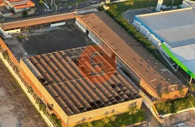 Venda ou aluga area de 27.000 m² com 12.000 m² de barracão à 2 km do centro