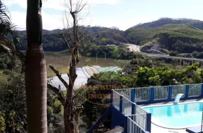 Excelente chácara com acesso á represa de paraibuna  ch00361
