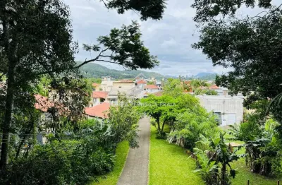 Casa com 3 quartos à venda na jacob pereira da cruz, 200, centro, porto belo por r$ 1.700.000