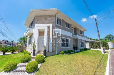 Casa de condomínio com 305 m², 4 quartos sendo 4 suítes à venda no bairro Umbará.