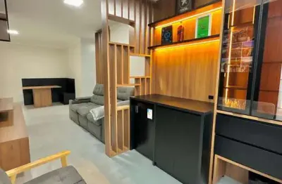 Imóvel moderno e decorado com 2 dormitórios e 2 vagas na praia grande