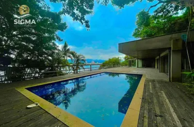 Casa com 5 suítes, piscina e vista para o mar com 2 vagas - peninsula, guarujá.