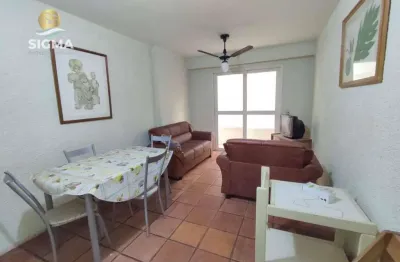 Apartamento localizado na praia das pitangueiras, 2 dormitórios mais dependência de empregada,  vista para o mar, 80 m² de área útil.