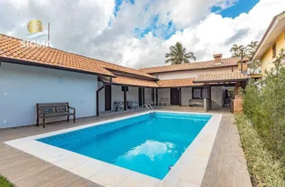 Alto padrão - casa à venda com 4 suítes - piscina e churrasqueira - 4 vagas - jardim acapulco - guarujá/sp