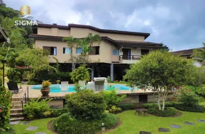 Casa na praia, condomínio fechado, 4 suítes, piscina, churrasqueira, jardim, costão do pernambuco, guarujá