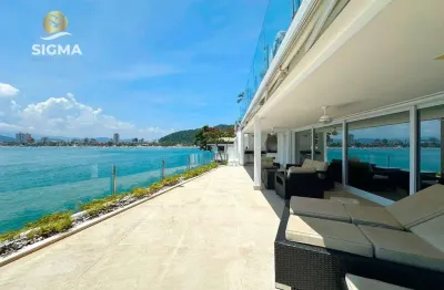 Frente mar - casa com 3 suítes à venda no condomínio península - guarujá/sp.