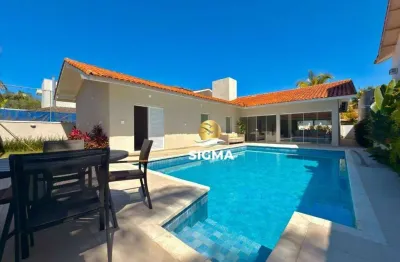 Casa com 4 dormitórios à venda, 240 m² por r$ 2.300.000,00 - jardim acapulco - guarujá/sp