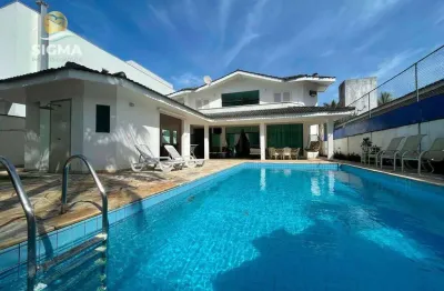 Casa com 4 dormitórios à venda, 345 m² por r$ 2.350.000 - jardim acapulco - guarujá/sp.