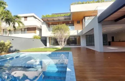 Mansão moderna no santa mônica jardins – 6 suítes, subsolo, piscina e alto luxo na barra da tijuca