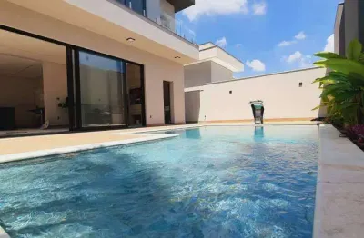 Casa à venda no condomínio residencial villagio, americana com 3 suítes e 4 vagas de garagem.