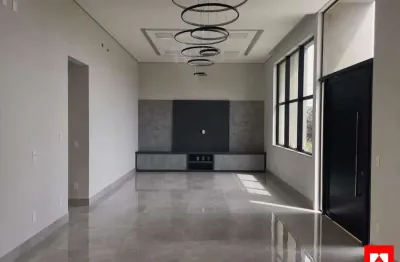 Casa à venda no condomínio pau brasil em americana com 3 suítes e 3 vagas de garagem