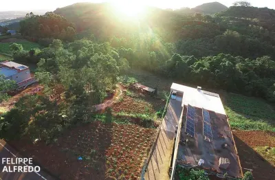 Terreno com vista do pôr-do-sol, 525m², à venda em morro reuter